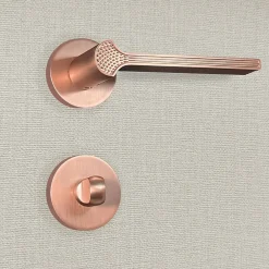 New Katchmee Poignée de porte design à condamnation finition aspect or rose Cristina -