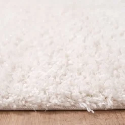 Clearance Unamourdetapis Tapis shaggy tissé motif uni LYN4 UNILA, crème